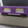 Lionel 6-16757 Johnny Lightning Display Boxcar By Eastwood Automobilia O SCALE NEW(Lionel 6 16757 Johnny Lightning Display Boxcar By Eastwood Automobilia O Scale New)