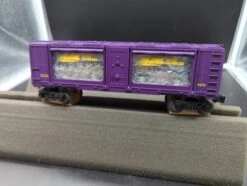 Lionel 6-16757 Johnny Lightning Display Boxcar By Eastwood Automobilia O SCALE NEW(Lionel 6 16757 Johnny Lightning Display Boxcar By Eastwood Automobilia O Scale New)